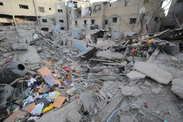 Palestinians inspect damage after Israeli strike in Nuseirat camp Palestinians inspect damage to their homes following an Israeli strike that targeted a house belonging to the al-Tawil family in the Nuseirat refugee camp in the central Gaza Strip on May 26, 2026. The strike destroyed the house completely and caused severe damage to neighboring homes. According to Palestinian medical sources, four Palestinians were wounded in the attack, which came after residents were warned to evacuate the area the previous night. Photo by Hassan al-Jedi apaimages Nusairat Gaza Strip Palestinian Territory 260526_Nuseirat_HJ_00(21).jpeg Copyright: xapaimagesxHassanxal-Jedixx xapaimagesx