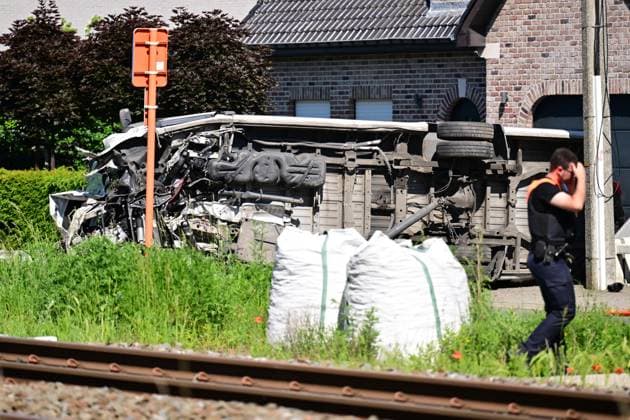 the scene of an accident between a train and a minivan, at the railway crossing Vierhuizen, in Buggenhout, Tuesday 26 May 2026. The accident happened around 8:15 am. Several people have been killed. According to initial reports, the level crossing was closed at the time of the accident.  DIRKxWAEM 175089930