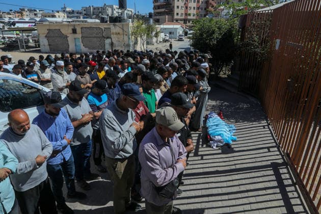 Palestinian girl killed in an Israeli attack on Khan Yunis KHAN YUNIS, GAZA, PALESTINE - MAY 26: Relatives of 14-year-old Palestinian girl Fatima Al-Khatib, who lost her life following the Israeli attack on al-Mawasi area, perform funeral prayer as they attend funeral ceremony after receiving the body from Nasser Hospital in Khan Yunis, Gaza, Palestine on May 26, 2026. Abed Rahim Khatib Anadolu Khan Yunis Gaza. Editorial use only. Please get in touch for any other usage.  Copyright: x2026xAnadoluxAbedxRahimxKhatibx