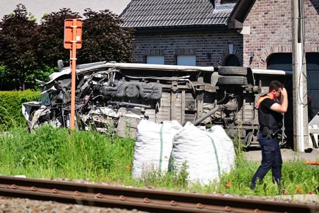 the scene of an accident between a train and a minivan, at the railway crossing Vierhuizen, in Buggenhout, Tuesday 26 May 2026. The accident happened around 8:15 am. Several people have been killed. According to initial reports, the level crossing was closed at the time of the accident.  DIRKxWAEM 175092703