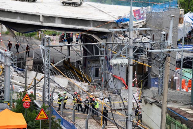 (260526) -- SEOUL, May 26, 2026 -- This photo taken on May 26, 2026 shows a scene at the site of an overpass collapse accident in Seoul, South Korea. Three people were killed and three others were injured in South Korea s overpass collapse accident, Yonhap news agency said Tuesday. A section of the upper deck collapsed at the overpass demolition site in Seoul at around 2:33 p.m. local time (0533 GMT). (Photo by Xinhua) (SpotNews) SOUTH KOREA-SEOUL-OVERPASS COLLAPSE ACCIDENT JunxHyosang 
