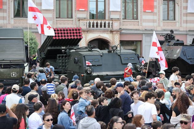 Georgia marks 108th anniversary of the founding of the republic TBILISI, GEORGIA - MAY 26: Local citizens and tourists inspect displayed military hardware and tactical vehicles at Freedom Square during the official celebrations marking the 108th anniversary of the founding of the Democratic Republic of Georgia in Tbilisi, Georgia on May 26, 2026. The national holiday was marked by a formal military parade in the capital. Following the official military march-past overseen by state officials, the cordoned-off square was opened to thousands of spectators under extensive security measures. Visitors, including families and international travelers, showed significant interest in the defense systems, armored personnel carriers, and specialized in  Copyright: x2026xAnadoluxDavitxKachkachishvilix