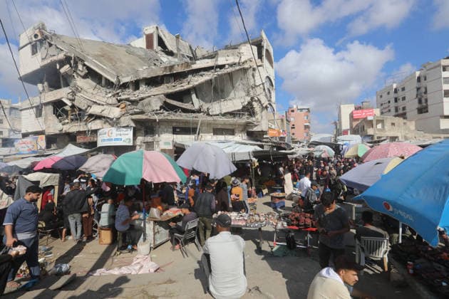 Palestinians walk through Gaza City market ahead of Eid al-Adha Palestinians walk through Al-Zawiya market in Gaza City on May 26, 2026, ahead of Eid al-Adha, as vendors display goods on temporary stalls. The market witnessed weak consumer demand and declining purchasing power amid worsening economic conditions caused by the ongoing war. Photo by Bilal Osama apaimages Gaza city Gaza Strip Palestinian Territory 260526_Gaza_BO_01(30) Copyright: xapaimagesxBilalxOsamax xapaimagesx