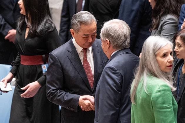 May 26, 2026, New York, New York, USA: Wang Yi, Member of the Political Bureau of the CPC Central Committee and Minister for Foreign Affairs of China speaks with Secretary-General Antonio Guterres before the Security Council meeting on Upholding the purposes and principles of the UN Charter and strengthening the UN-centered international system at UN Headquarters in New York, NY on May 26, 2026. China organized this meeting as it is a President of Security Council for the month of May. New York USA - ZUMAr339 20260526_znp_r339_014 Copyright: xLevxRadinx