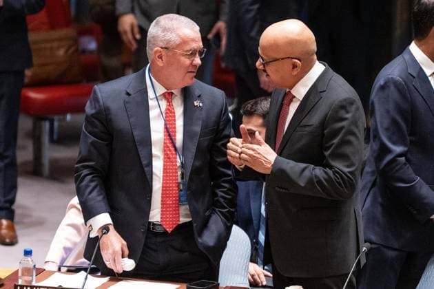 May 26, 2026, New York, New York, USA: Michael George DeSombre, Assistant Secretary of.State for East Asian and Pacific Affairs speaks with Abdullatif bin Rashid Al Zayani, Minister for Foreign Affairs of Bahrain before the Security Council meeting on Upholding the purposes and principles of the UN Charter and strengthening the UN-centered international system at UN Headquarters in New York, NY on May 26, 2026. China organized this meeting as it is a President of Security Council for the month of May. New York USA - ZUMAr339 20260526_znp_r339_016 Copyright: xLevxRadinx