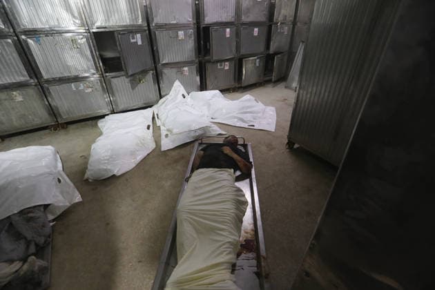 Mourners bid farewell to Palestinians killed in Gaza strike Mourners take a final look at the bodies of Palestinians killed in an Israeli airstrike, at al-Shifa Hospital in Gaza City, on Tuesday, May 26, 2026. Photo by Belal Osama apaimages Gaza Gaza Strip Palestinian Territory 260526_Gaza_BO_2_00(35) Copyright: xapaimagesxBelalxOsamax xapaimagesx