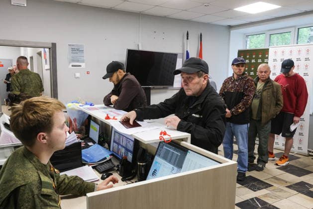 RUSSIA, MOSCOW REGION - MAY 27, 2026: Men are seen at the Moscow Region s recruitment center for contract military service in Balashikha, east of Moscow. Sergei Karpukhin TASS  93094346