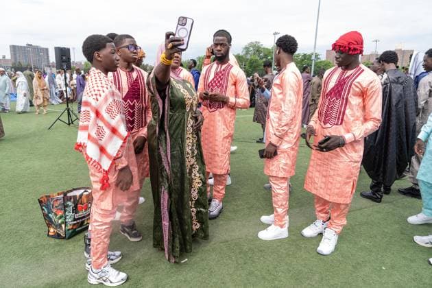 May 27, 2026, New York, New York, USA: People seen after pray and Mayor Zohran Mamdani delivered remarks during Eid Al-Adha holiday prayers at The Yancy Track & Field in New York, NY on May 27, 2026. Hundreds of men, women and children attended wearing clean, colorful and expensive traditional clothes. Eid al-Adha translates from Arabic to Festival of Sacrifice is one of the most important holidays in the Islamic calendar. It honors the Prophet Ibrahim s (Abraham s in Judaism) absolute obedience to God, commemorating his willingness to sacrifice his son as an act of submission before God provided a ram to sacrifice instead. New York USA  - ZUMAr339 20260527_znp_r339_025 Copyright: xLevxRadinx