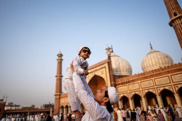 Eid al-Adha in India NEW DELHI, INDIA - MAY 28: A Muslim man celebrates with his son after offering Eid al-Adha prayers at Jama Masjid in New Delhi, India, on May 28, 2026. Amarjeet Kumar Singh Anadolu New Delhi India. Editorial use only. Please get in touch for any other usage.  Copyright: x2026xAnadoluxAmarjeetxKumarxSinghx