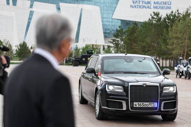 KAZAKHSTAN, ASTANA - MAY 28, 2026: A car carrying Russia s President Vladimir Putin is seen during a welcome ceremony outside the Independence Palace. Alexander Kazakov Russian Presidential Press and Information Office TASS  93124029