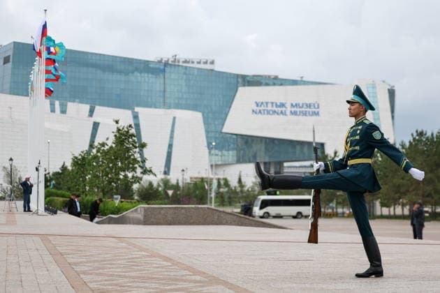 KAZAKHSTAN, ASTANA - MAY 28, 2026: An honour guard marches outside the Independence Palace during a welcome ceremony marking the arrival of Russia s President Vladimir Putin. The Russian president arrived in Kazakhstan on a state visit. Alexander Kazakov Russian Presidential Press and Information Office TASS  93123987