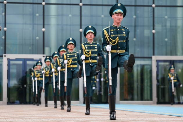 KAZAKHSTAN, ASTANA - MAY 28, 2026: Honour guards march outside the Independence Palace during a welcome ceremony marking the arrival of Russia s President Vladimir Putin. The Russian president arrived in Kazakhstan on a state visit. Alexander Kazakov Russian Presidential Press and Information Office TASS  93123990