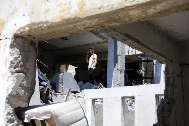 Displaced Palestinians inspect damage after deadly Israeli strike in Gaza City Displaced Palestinians inspect their damaged homes and tents following an Israeli strike that targeted a residential apartment in Gaza City on May 28, 2026. The strike, which took place the previous night, killed 10 Palestinians and wounded others, according to local sources, while causing severe damage to the targeted building and nearby tents sheltering displaced people. Photo by Anas Nour apaimages Gaza city Gaza Strip Palestinian Territory 280526_Gaza_AN_00(24) Copyright: xapaimagesxAnasxNourx xapaimagesx