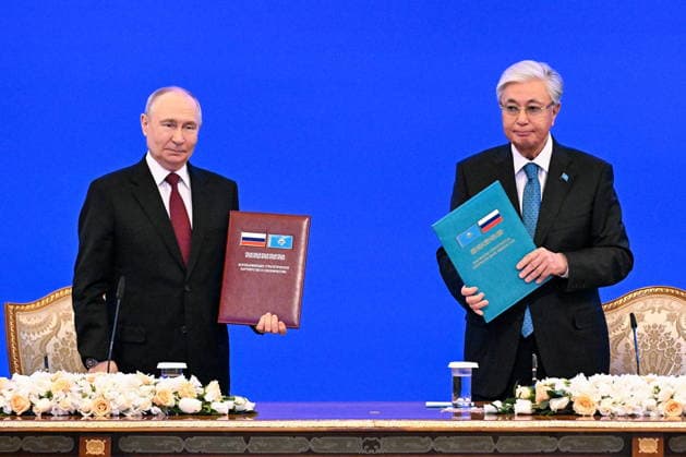 KAZAKHSTAN, ASTANA - MAY 28, 2026: Russia s President Vladimir Putin (L) and Kazakhstan s President Kassym-Jomart Tokayev pose during a ceremony to sign joint documents at the Independence Palace. Sergei Bobylev TASS  93130822