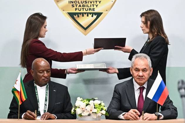 Russia International Security Forum 9175333 28.05.2026 Zimbabwean Minister of State for National Security Lovemore Matuke and Russian Security Council Secretary Sergei Shoigu attend a signing ceremony following their meeting on the sidelines of the 1st International Security Forum (ISF) at Live Arena, outside Moscow, Russia. Kristina Solovyova Sputnik Moscow region Russia  Copyright: xKristinaxSolovyovax