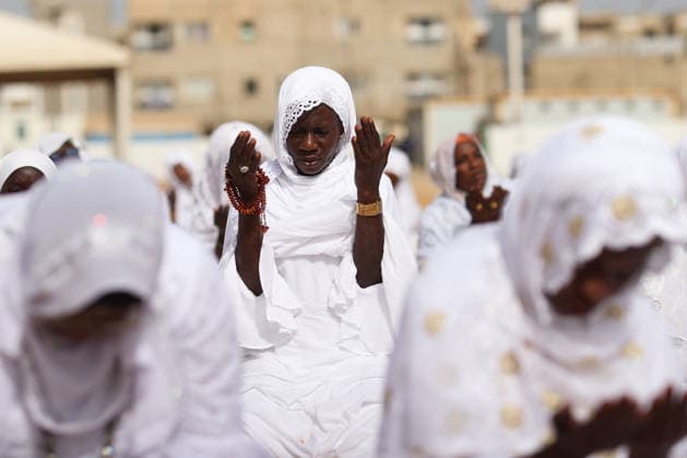 Eid al-Adha prayer on the beach in Dakar DAKAR, SENEGAL - MAY 28: Followers of the Layene order perform the Eid al-Adha prayer dressed in white on the beach in Dakar, Senegal where the first day of Eid al-Adha is being observed today on May 28, 2026. In the Yoff district of the capital Dakar, thousands gathered on the beach around the tomb of Seydina Limamou Laye, the founder of the Layene order, for the Eid prayer. Cem Ozdel Anadolu Dakar Senegal. Editorial use only. Please get in touch for any other usage.  Copyright: x2026xAnadoluxCemxOzdelx