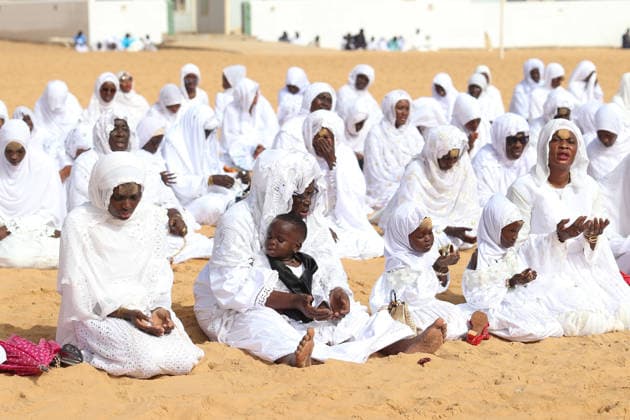 Eid al-Adha prayer on the beach in Dakar DAKAR, SENEGAL - MAY 28: Followers of the Layene order perform the Eid al-Adha prayer dressed in white on the beach in Dakar, Senegal where the first day of Eid al-Adha is being observed today on May 28, 2026. In the Yoff district of the capital Dakar, thousands gathered on the beach around the tomb of Seydina Limamou Laye, the founder of the Layene order, for the Eid prayer. Cem Ozdel Anadolu Dakar Senegal. Editorial use only. Please get in touch for any other usage.  Copyright: x2026xAnadoluxCemxOzdelx