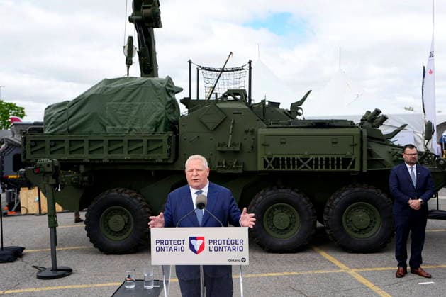 May 28, 2026, Ottawa, On, Canada: Premier of Ontario Doug Ford speaks in front of a General Dynamics Land Systems-Canada (GDLS-C) Armoured Combat Support Vehicle (ACSV), at a news conference at the Canadian Association of Defence and Security Industries annual defence industry trade show CANSEC, in Ottawa, on Thursday, May 28, 2026. Ottawa Canada  - ZUMAc35_ 20260528_zaf_c35_011 Copyright: xJustinxTangx