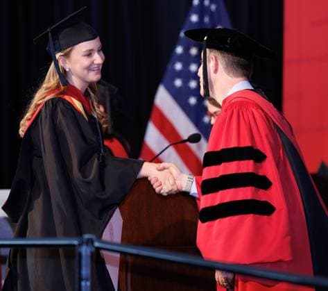 Crown Princess Elisabeth pictured during the the diploma ceremony on the campus of HKS (Harvard Kennedy School), where graduates are recognized individually and receive their diplomas on stage, part of the Class of 2026 graduation days in Harvard University, in Cambridge, USA, Thursday 28 May 2026.  BENOITxDOPPAGNE 175334289