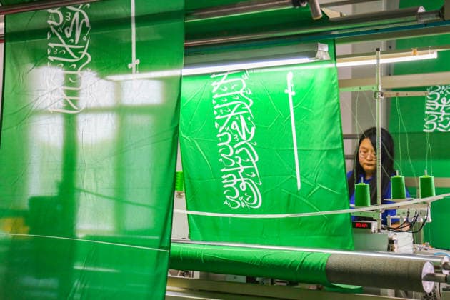 QINGDAO, CHINA - MAY 28: Workers are busy in front of an assembly line of flags for the FIFA World Cup at Qingdao Wonderful Flag Industry Co on May 28, 2026 in Qingdao, Shandong Province of China. As the 2026 FIFA World Cup is around the corner, production lines at a flag manufacturer in Qingdao, Shandong province, are running at full speed to produce various types of flags, many of which will soon appear in stadiums across North America.  Copyright: xVCGx 111644648659