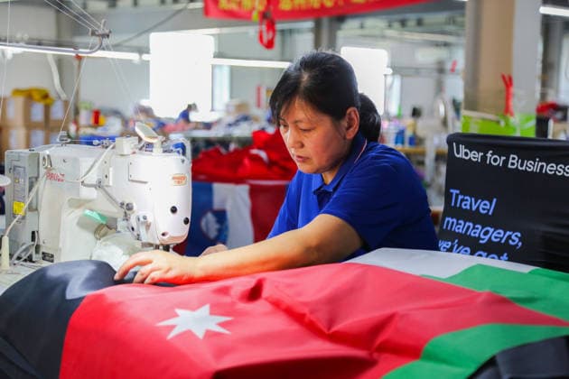 QINGDAO, CHINA - MAY 28: Workers are busy in front of an assembly line of flags for the FIFA World Cup at Qingdao Wonderful Flag Industry Co on May 28, 2026 in Qingdao, Shandong Province of China. As the 2026 FIFA World Cup is around the corner, production lines at a flag manufacturer in Qingdao, Shandong province, are running at full speed to produce various types of flags, many of which will soon appear in stadiums across North America.  Copyright: xVCGx 111644648665