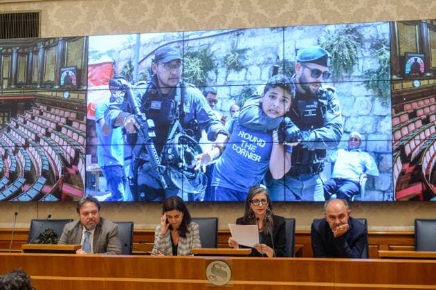 IPA85160345 - Rome Senate presentation of UN special rapporteur s report on the occupied Palestinian territories, pictured Dario Carotenuto Laura Boldrini Francesca Albanese Peppe De Cristofaro in the background images from Gaza  Copyright: xSTEFANOxCAROFEIx xSTEFANOxCAROFEIx xFOTOGRAMMAx 85160345