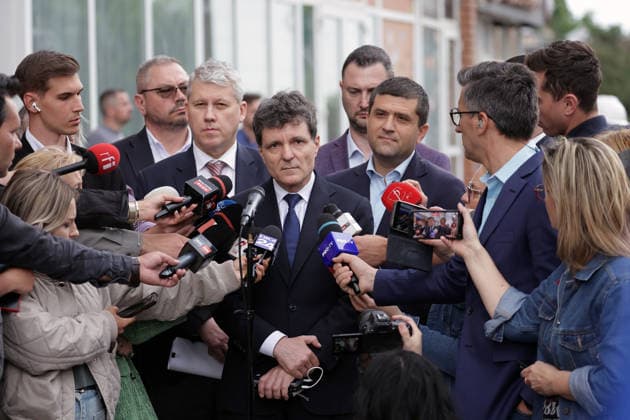 (260529) -- GALATI, May 29, 2026 -- Romania s President Nicusor Dan speaks to journalists after visiting the residential apartment building damaged by a Russian drone in Galati, Romania, May 29, 2026. At least two people were injured after a drone struck a residential apartment building in Galati, Romania, near the border with Ukraine, local media reported Friday. (Photo by Xinhua) ROMANIA-GALATI-DRONE CristianxCristel 