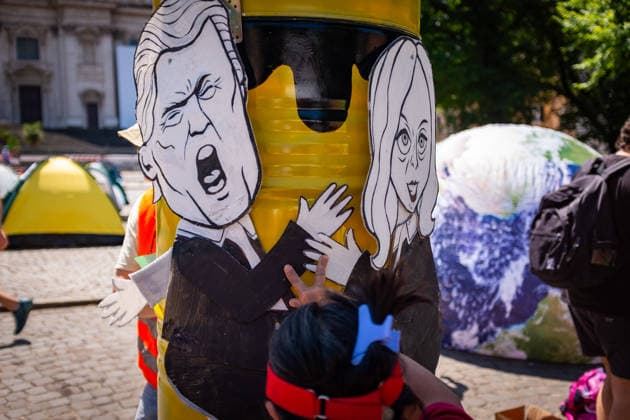 May 30, 2026, Rome, Rm, Italy: Extinction Rebellion activists are launching a 24-hour rally in Piazza dell Esquilino, just days before the 80th anniversary of the Italian Republic on June 2nd. They say: there is nothing to celebrate as long as rights, justice, and dignity continue to be denied. Oil extraction is imposed through violence and war to produce ever more energy, further increasing inequality. Activists pin drawings of Donald Trump and Giorgia Meloni to a rocket made of oil drums. It reads: Fascists on Mars. Rome Italy  - ZUMAg256 20260530_znp_g256_015 Copyright: xMarcoxDixGianvitox