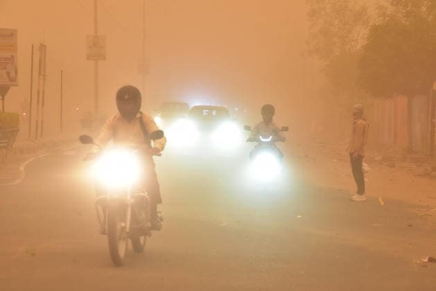 Vehicles move on a road amid a dust storm Bikaner, May 30 (ANI): Vehicles move on a road amid a dust storm, in Bikaner on Saturday. Bikaner Rajasthan India Copyright: xANIx ANI_20260530159