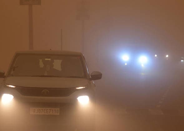 Vehicles move on a road amid a dust storm Bikaner, May 30 (ANI): Vehicles move on a road amid a dust storm, in Bikaner on Saturday. Bikaner Rajasthan India Copyright: xANIx ANI_20260530160