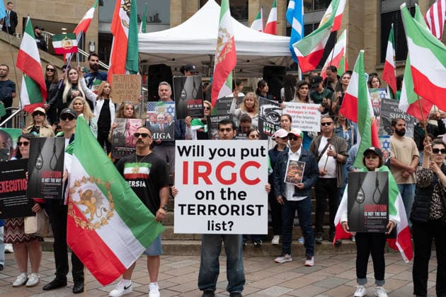 May 30, 2026, Glasgow, Scotland, UK: Members of Scotlands Iranian community opposed to the Islamic regime held a demonstration highlighting alleged human rights abuses against political prisoners, as well as the regimes use of capital punishment. The protest mainly focused on the treatment of those imprisoned following demonstrations in Iran earlier this year, while also acknowledging the recent partial restoration of internet access in the country. Glasgow UK - ZUMAs357 20260530_zip_s357_016 Copyright: xCameronxScottx