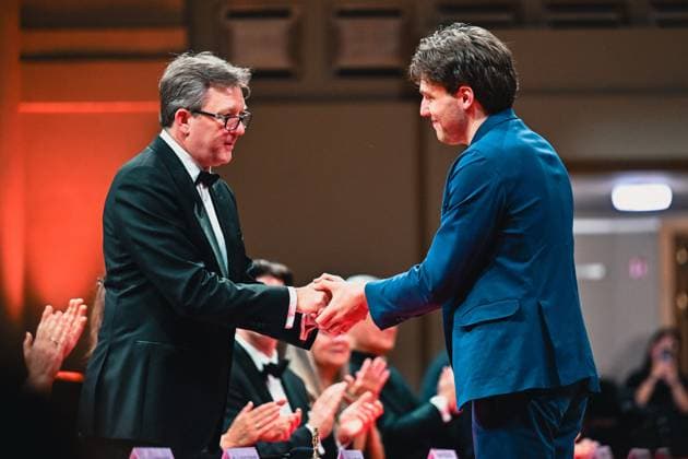 President of the jury Gilles Ledure, the winner and Ettore Pagano of Italy pictured after the final of the 2026 Queen Elisabeth Cello Competition, at the Brussels Bozar concert hall, Saturday 30 May 2026. This year s edition of the competition for career-starting musicians takes place from 4 to 30 May.  EMILExWINDAL 175504754