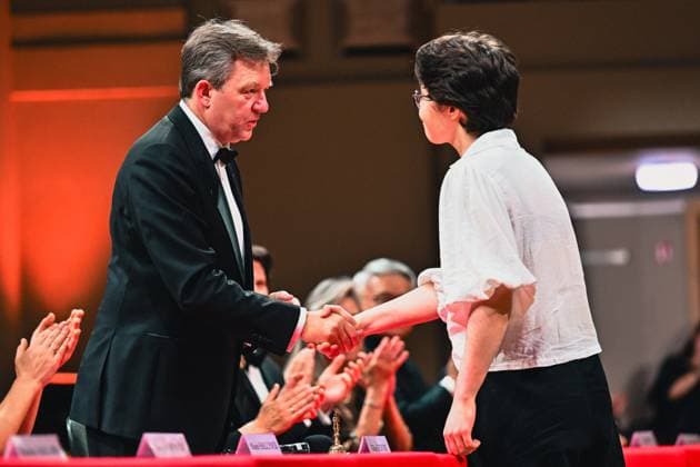 President of the jury Gilles Ledure and Maria Zaitseva of Russia pictured after the final of the 2026 Queen Elisabeth Cello Competition, at the Brussels Bozar concert hall, Saturday 30 May 2026. This year s edition of the competition for career-starting musicians takes place from 4 to 30 May.  EMILExWINDAL 175512772