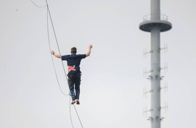 Slackliner walks between two tallest building in Warsaw Photo: Dawid Wolski East News Estonian slackliner Jaan Roose attempts to walk the highline between two tallest buildings in the Polish capital during the Red Bull Line of Time over Warsaw event on May 31, 2026 in Warsaw, Poland. The 500-meter-long slackline is stretched between the communist era, Soviet designed Palace of Culture and Science and recently constructed, designed by Foster and Partners Varso Tower at 180 meters above street level. EN_01678444_0030 