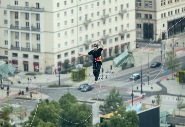 Slackliner walks between two tallest building in Warsaw Photo: Adam Burakowski East News Estonian slackliner Jaan Roose attempts to walk the highline between two tallest buildings in the Polish capital during the Red Bull Line of Time over Warsaw event on May 31, 2026 in Warsaw, Poland. The 500-meter-long slackline is stretched between the communist era, Soviet designed Palace of Culture and Science and recently constructed, designed by Foster and Partners Varso Tower at 180 meters above street level. EN_01678444_0058 