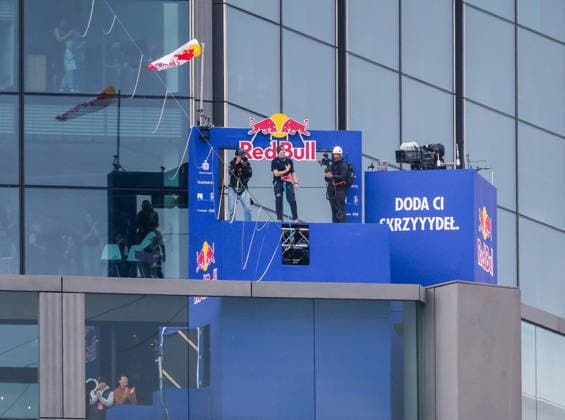 Slackliner walks between two tallest building in Warsaw Photo: Dawid Wolski East News Estonian slackliner Jaan Roose attempts to walk the highline between two tallest buildings in the Polish capital during the Red Bull Line of Time over Warsaw event on May 31, 2026 in Warsaw, Poland. The 500-meter-long slackline is stretched between the communist era, Soviet designed Palace of Culture and Science and recently constructed, designed by Foster and Partners Varso Tower at 180 meters above street level. EN_01678444_0063 