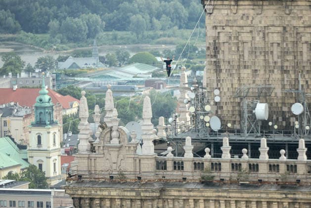 Slackliner walks between two tallest building in Warsaw Photo: Adam Burakowski East News Estonian slackliner Jaan Roose attempts to walk the highline between two tallest buildings in the Polish capital during the Red Bull Line of Time over Warsaw event on May 31, 2026 in Warsaw, Poland. The 500-meter-long slackline is stretched between the communist era, Soviet designed Palace of Culture and Science and recently constructed, designed by Foster and Partners Varso Tower at 180 meters above street level. EN_01678444_0069 