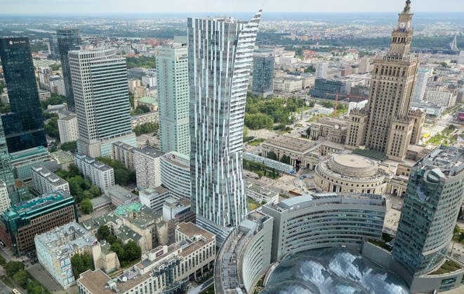 Slackliner walks between two tallest building in Warsaw Photo: Adam Burakowski East News Estonian slackliner Jaan Roose attempts to walk the highline between two tallest buildings in the Polish capital during the Red Bull Line of Time over Warsaw event on May 31, 2026 in Warsaw, Poland. The 500-meter-long slackline is stretched between the communist era, Soviet designed Palace of Culture and Science and recently constructed, designed by Foster and Partners Varso Tower at 180 meters above street level. EN_01678444_0076 