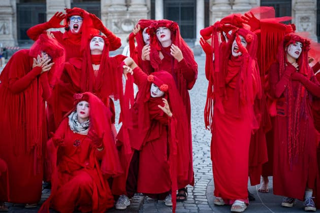 May 31, 2026, Rome, Rm, Italy: A few days before the 80th anniversary of the Italian Republic on June 2nd, the action of Red Rebels Brigade, in front of San Giovanni Basilica, expresses the deep sorrow for the victims of war and the climate crisis, showing their anger toward the government that finances both with its policies. The Red Rebels are a symbol of hope for a world where violence does not reign, but rather peace and harmony with the earth. Rome Italy  - ZUMAg256 20260531_znp_g256_004 Copyright: xMarcoxDixGianvitox
