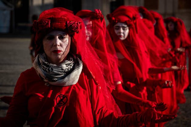May 31, 2026, Rome, Rm, Italy: A few days before the 80th anniversary of the Italian Republic on June 2nd, the action of Red Rebels Brigade, in front of San Giovanni Basilica, expresses the deep sorrow for the victims of war and the climate crisis, showing their anger toward the government that finances both with its policies. The Red Rebels are a symbol of hope for a world where violence does not reign, but rather peace and harmony with the earth. Rome Italy  - ZUMAg256 20260531_znp_g256_022 Copyright: xMarcoxDixGianvitox