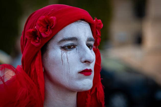 May 31, 2026, Rome, Rm, Italy: A few days before the 80th anniversary of the Italian Republic on June 2nd, the action of Red Rebels Brigade, in front of San Giovanni Basilica, expresses the deep sorrow for the victims of war and the climate crisis, showing their anger toward the government that finances both with its policies. The Red Rebels are a symbol of hope for a world where violence does not reign, but rather peace and harmony with the earth. Rome Italy  - ZUMAg256 20260531_znp_g256_021 Copyright: xMarcoxDixGianvitox