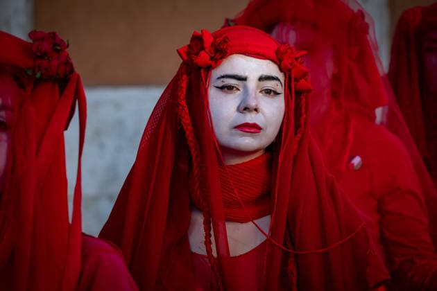 May 31, 2026, Rome, Rm, Italy: A few days before the 80th anniversary of the Italian Republic on June 2nd, the action of Red Rebels Brigade, in front of San Giovanni Basilica, expresses the deep sorrow for the victims of war and the climate crisis, showing their anger toward the government that finances both with its policies. The Red Rebels are a symbol of hope for a world where violence does not reign, but rather peace and harmony with the earth. Rome Italy  - ZUMAg256 20260531_znp_g256_024 Copyright: xMarcoxDixGianvitox
