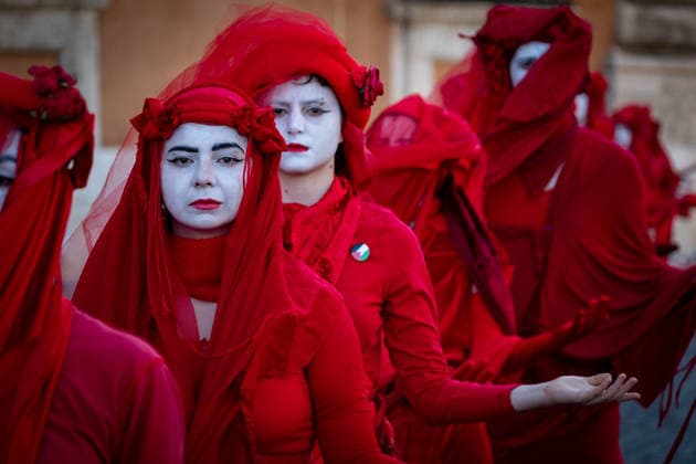May 31, 2026, Rome, Rm, Italy: A few days before the 80th anniversary of the Italian Republic on June 2nd, the action of Red Rebels Brigade, in front of San Giovanni Basilica, expresses the deep sorrow for the victims of war and the climate crisis, showing their anger toward the government that finances both with its policies. The Red Rebels are a symbol of hope for a world where violence does not reign, but rather peace and harmony with the earth. Rome Italy  - ZUMAg256 20260531_znp_g256_023 Copyright: xMarcoxDixGianvitox