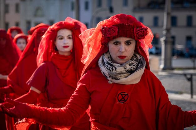 May 31, 2026, Rome, Rm, Italy: A few days before the 80th anniversary of the Italian Republic on June 2nd, the action of Red Rebels Brigade, in front of San Giovanni Basilica, expresses the deep sorrow for the victims of war and the climate crisis, showing their anger toward the government that finances both with its policies. The Red Rebels are a symbol of hope for a world where violence does not reign, but rather peace and harmony with the earth. Rome Italy  - ZUMAg256 20260531_znp_g256_032 Copyright: xMarcoxDixGianvitox