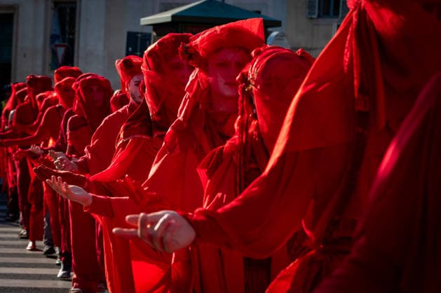 May 31, 2026, Rome, Rm, Italy: A few days before the 80th anniversary of the Italian Republic on June 2nd, the action of Red Rebels Brigade, in front of San Giovanni Basilica, expresses the deep sorrow for the victims of war and the climate crisis, showing their anger toward the government that finances both with its policies. The Red Rebels are a symbol of hope for a world where violence does not reign, but rather peace and harmony with the earth. Rome Italy  - ZUMAg256 20260531_znp_g256_040 Copyright: xMarcoxDixGianvitox