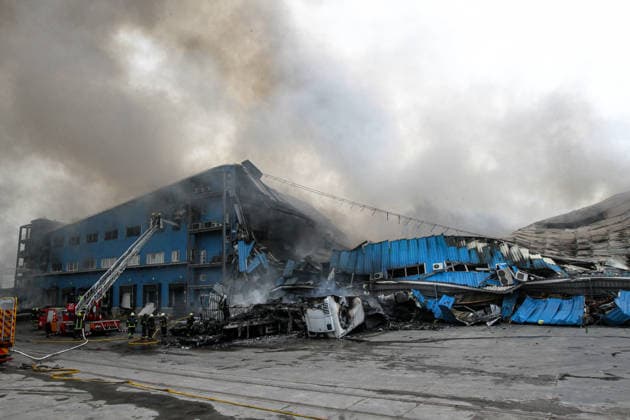 Rescuers use an aerial work platform to extinguish a fire at Nova Poshta Branch No. 1, destroyed by a Russian drone strike, Dnipro, Ukraine, on May 31, 2026. The strike destroyed the branch completely, with the building burning down. Cars parked nearby were also damaged. (Photo by Mykola Miakshykov Ukrinform) Russian drone attack destroys post branch in Dnipro  Copyright: xMykolaxMiakshykovx
