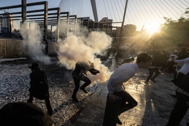 Ultra-Orthodox Jews protest mandatory military service in Jerusalem JERUSALEM - JUNE 1: Israeli police use stun grenades and mounted units to disperse ultra-Orthodox Jewish (Haredi) demonstrators protesting the detention of draft resisters and mandatory military service in West Jerusalem on June 1, 2026. Gathering at the Hamitarim Bridge, a major junction in the city, protesters condemned the arrest of nine Haredi men in Beit Shemesh a day earlier and blocked traffic, causing major disruptions before police moved to clear the roadway. Mostafa Alkharouf Anadolu Jerusalem Israel. Editorial use only. Please get in touch for any other usage.  Copyright: x2026xAnadoluxMostafaxAlkharoufx