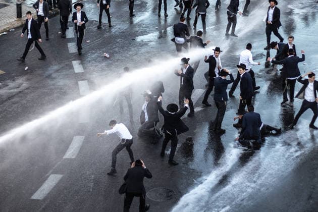 Ultra-Orthodox Jews protest mandatory military service in Jerusalem JERUSALEM - JUNE 1: Israeli police use stun grenades and mounted units to disperse ultra-Orthodox Jewish (Haredi) demonstrators protesting the detention of draft resisters and mandatory military service in West Jerusalem on June 1, 2026. Gathering at the Hamitarim Bridge, a major junction in the city, protesters condemned the arrest of nine Haredi men in Beit Shemesh a day earlier and blocked traffic, causing major disruptions before police moved to clear the roadway. Mostafa Alkharouf Anadolu Jerusalem Israel. Editorial use only. Please get in touch for any other usage.  Copyright: x2026xAnadoluxMostafaxAlkharoufx