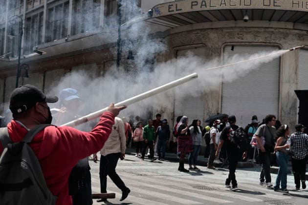 June 1, 2026, Mexico City, Cdmx, Mexico: Teachers from the state of Guerrero, members of the National Coordinator of Education Workers (CNTE), arrived in Mexico City with the intention of entering the ZoÂ³calo. The CNTE teachers marched through several streets, eventually reaching Avenida 20 de Noviembre, where they began damaging a crane belonging to the Secretariat of Citizen Security (SSC). The police had used the crane to try to block the march, but this proved impossible. Just as they reached one of the main entrances to the Plaza de la ConstitucioÂ³n, a confrontation erupted between the teachers and the police. Both sides engaged in aggression; the teachers threw homemade explosives that only made noise and tried unsuccessfully to b  - ZUMAp204 20260601_zip_p204_031 Copyright: xJosuexPerezx