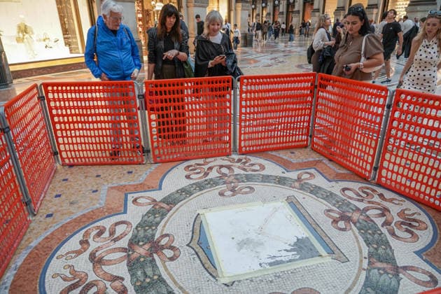 IPA85258295 - MILAN, 2 06 2026 - Galleria Vittorio Emanuele, the famous Taurus mosaic in the Galleria covered after restoration with coins thrown by tourists.  Copyright: xEmanuelexRobertoxDexCarlix xx 85258295